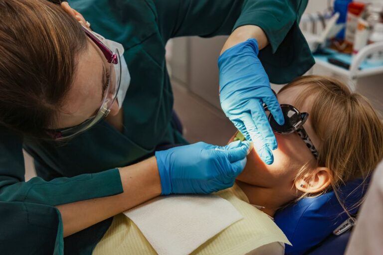 Dentist working with a child