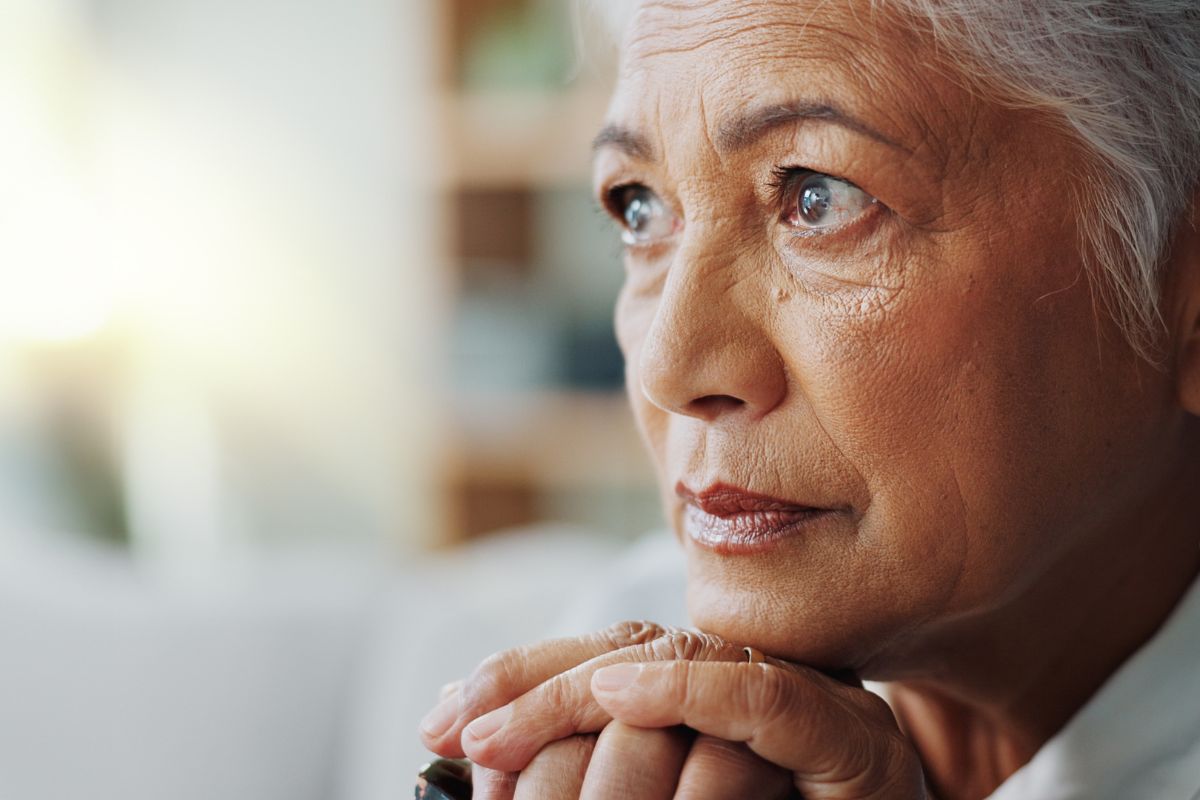 close up of older woman thinking
