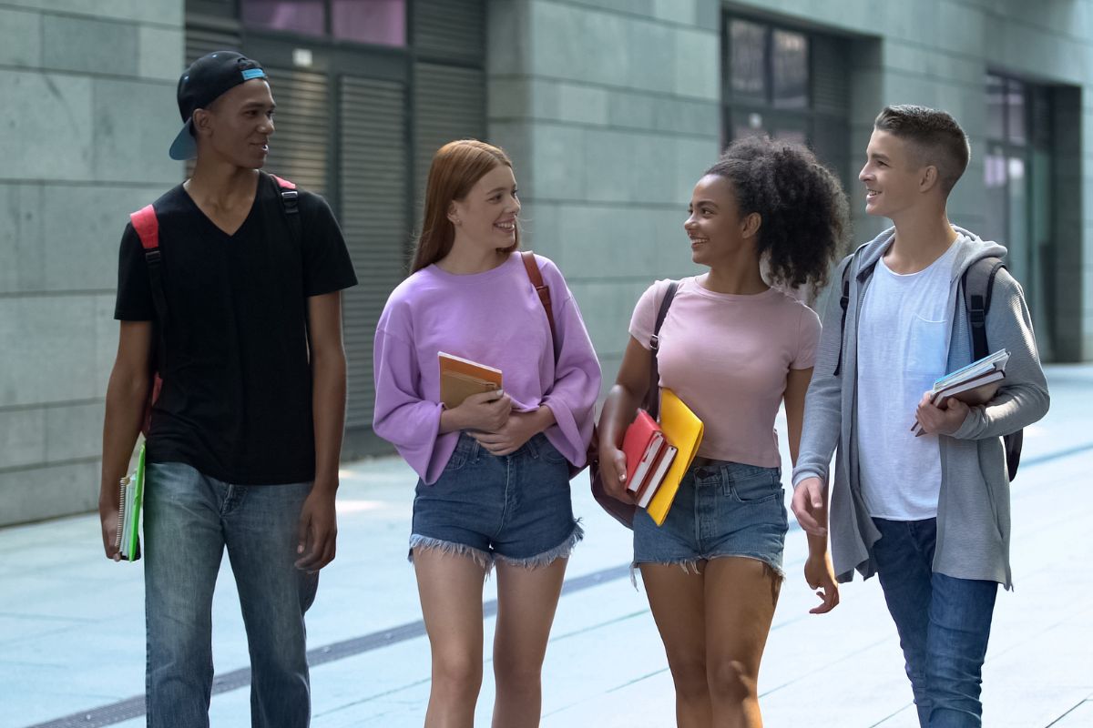 Group of teens walking and talking