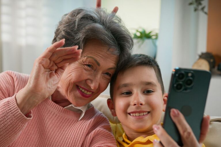 grandmother and grandson taking a selfie