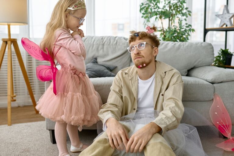 Dad with a girl looking tired
