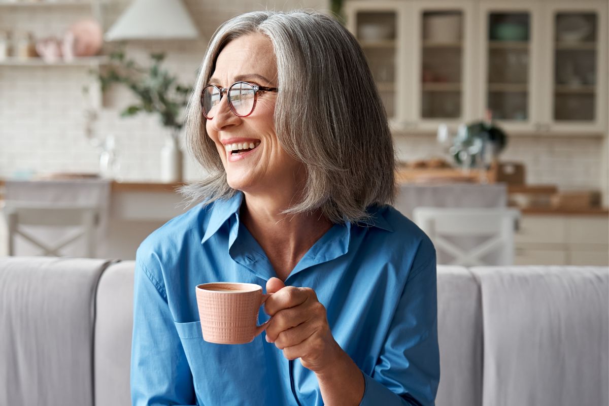 woman holding a cup of coffee
