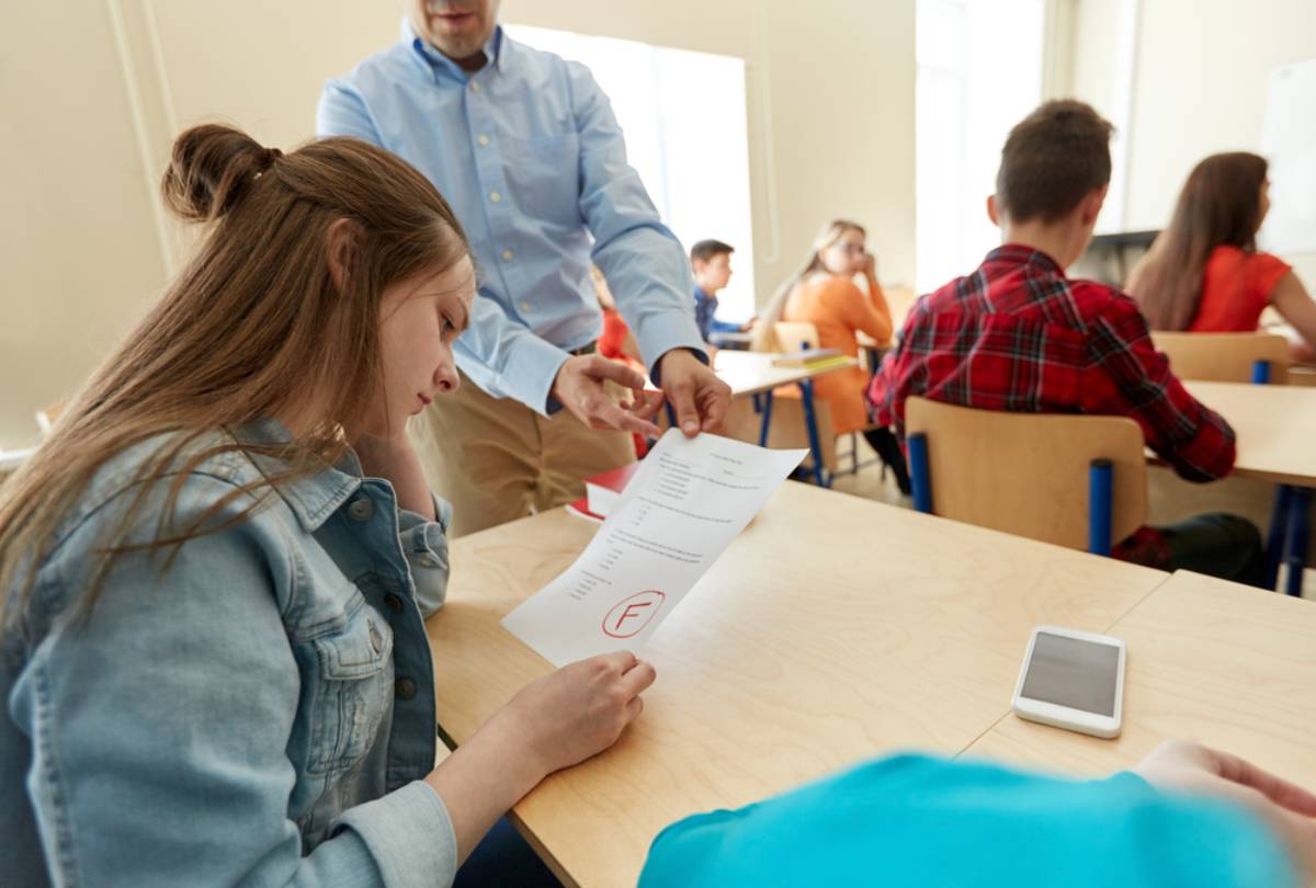 A Mom Says Her Daughter's Teacher Returned Every Test Face Down Except Hers, Which Was Left Face Up on Her Desk for the Class to See