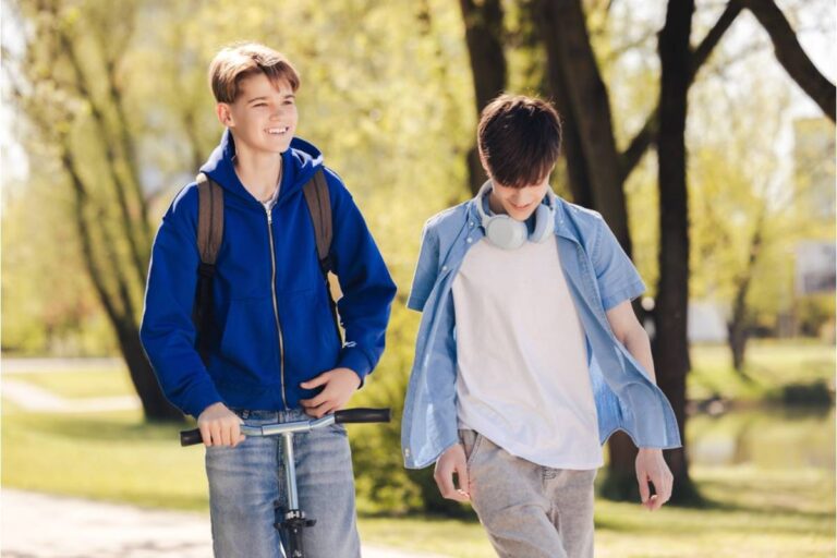 A Teacher Says a Student's Older Cousin Walks Him to School Every Day Because His Parents' Shifts Start Before the Buses Run
