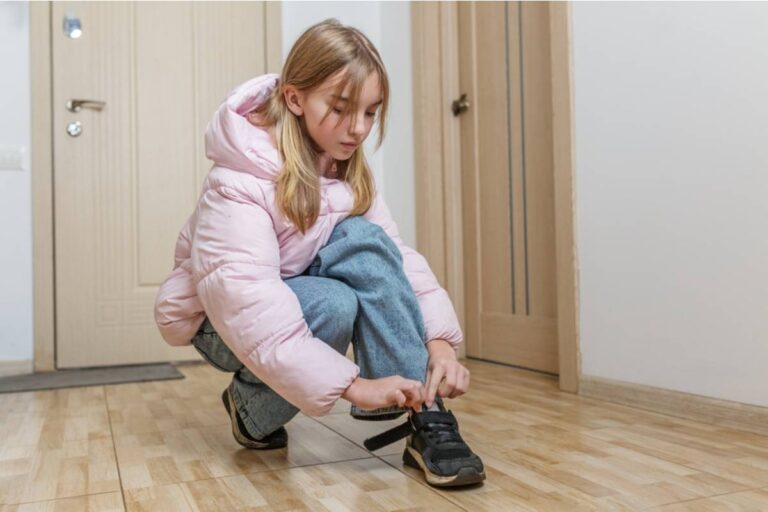 A Mom Found Out Her Daughter Had Been Wearing Her Brother's Old Sneakers to School and Telling Friends They Were a "Vintage Find"