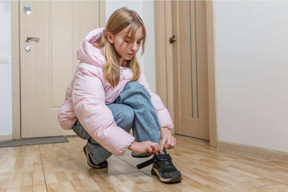 A Mom Found Out Her Daughter Had Been Wearing Her Brother's Old Sneakers to School and Telling Friends They Were a "Vintage Find"