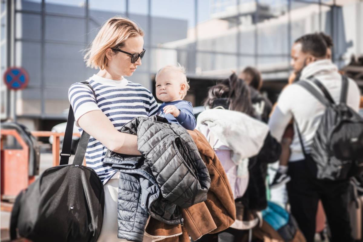 A Mom Says Her Family Vacation With a Toddler and Infant Felt Like Parenting on Hard Mode, and Her Partner Still Wants a 24-Hour Trip Next Year