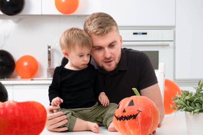 A Dad Says He Was Only Trying to Make a Halloween Memory When His Toddler Started Crying at a Giant Spider, and Parents Had Very Different Opinions