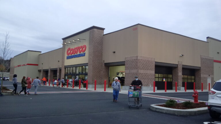 Exterior of a Costco Wholesale warehouse store with its red and blue sign