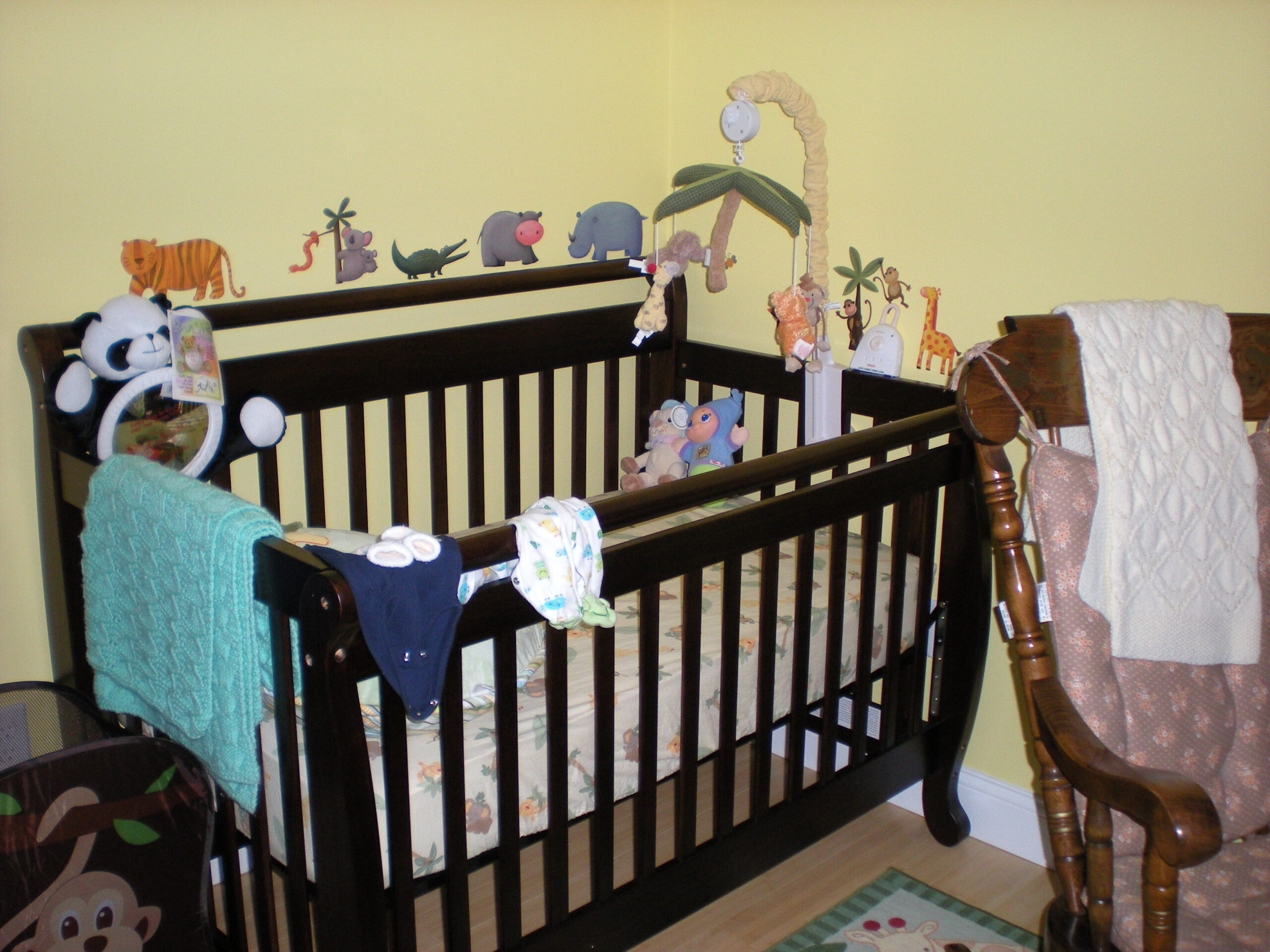 A baby's crib in a home nursery