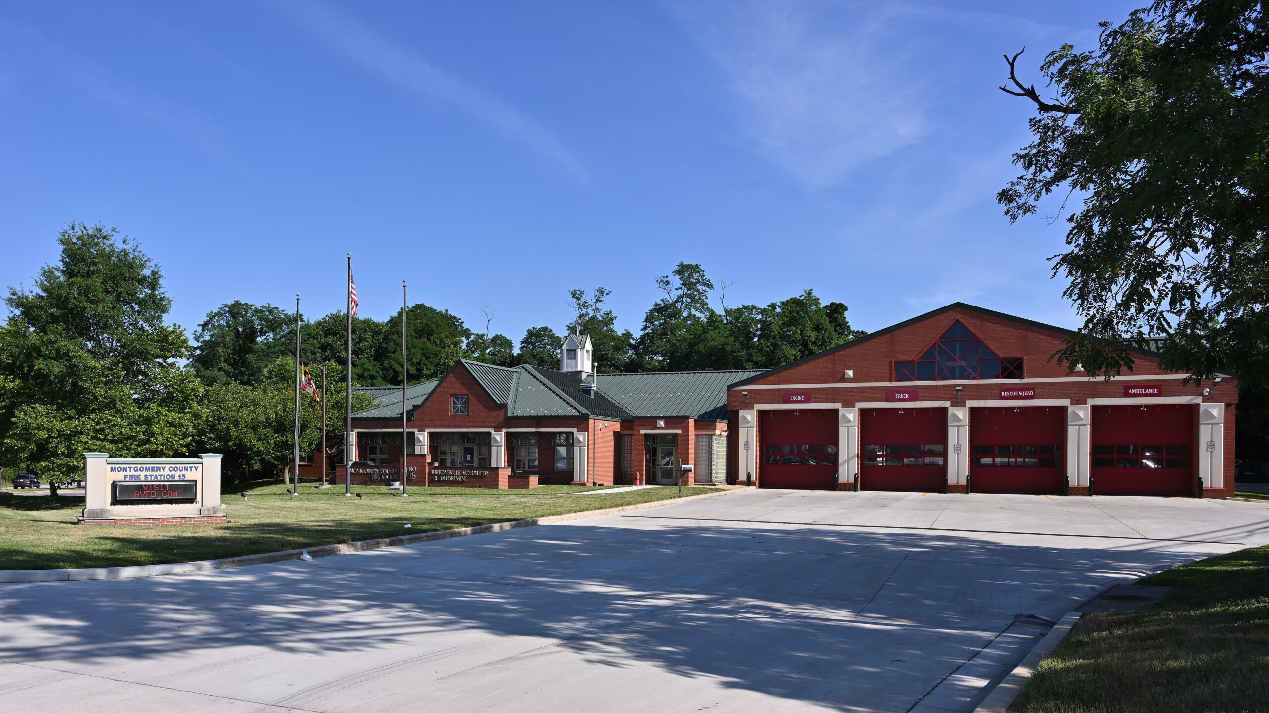 Fire engines parked in a fire station garage